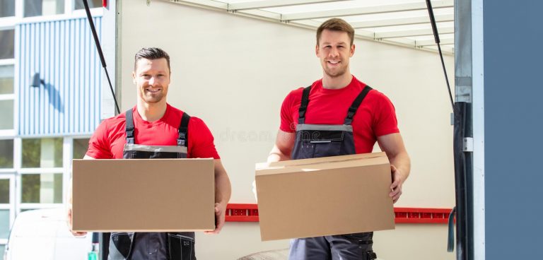 happy male movers holding cardboard boxes young standing moving van 211152207