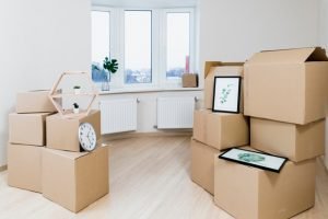 stack moving cardboard boxes new apartment 23 2148060032